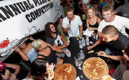 Local sporting identities gorged themselves to raise money for flood victims. Local sporting identities gorged themselves to raise money for flood victims.